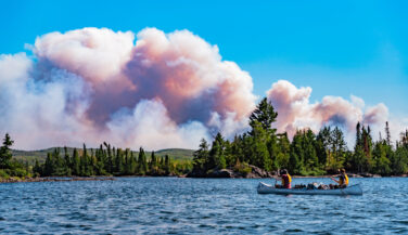 Plumes of smoke as a paddling group evacuates the BWCA.
